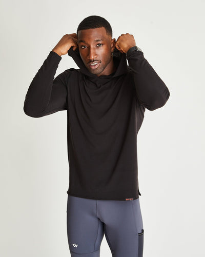 Greg (6’2") is wearing size medium