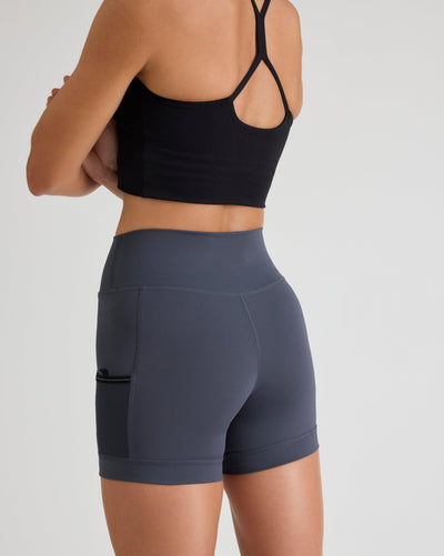 Niki (5’8”) is wearing a size small 4" inseam.
