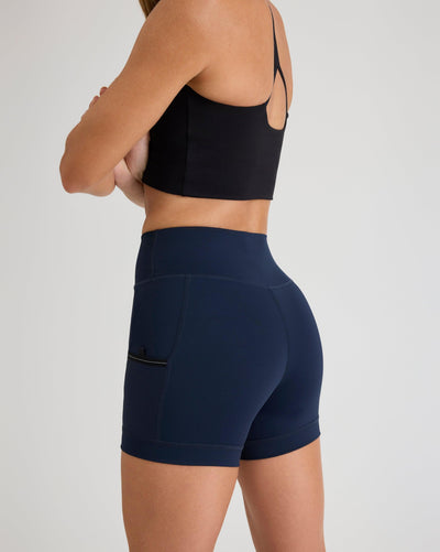 Niki (5’8”) is wearing a size small 4" inseam.