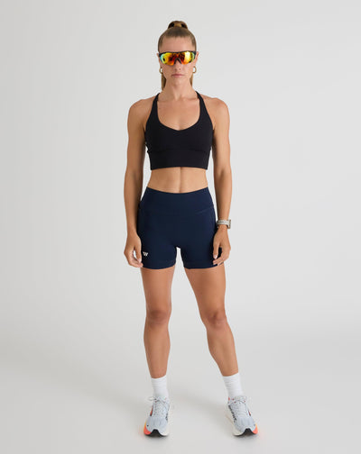 Niki (5’8”) is wearing a size small 4" inseam.