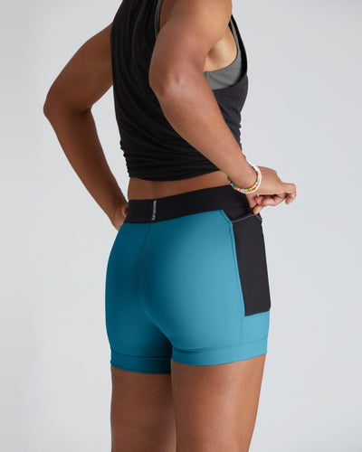Traci (5'8") is wearing size small 4" inseam