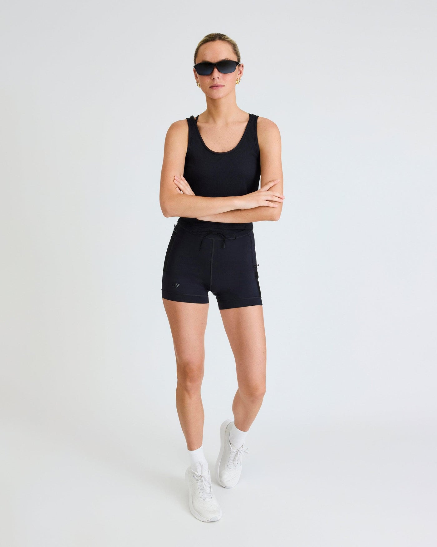 Olivia (5'7") is wearing size small 4" inseam