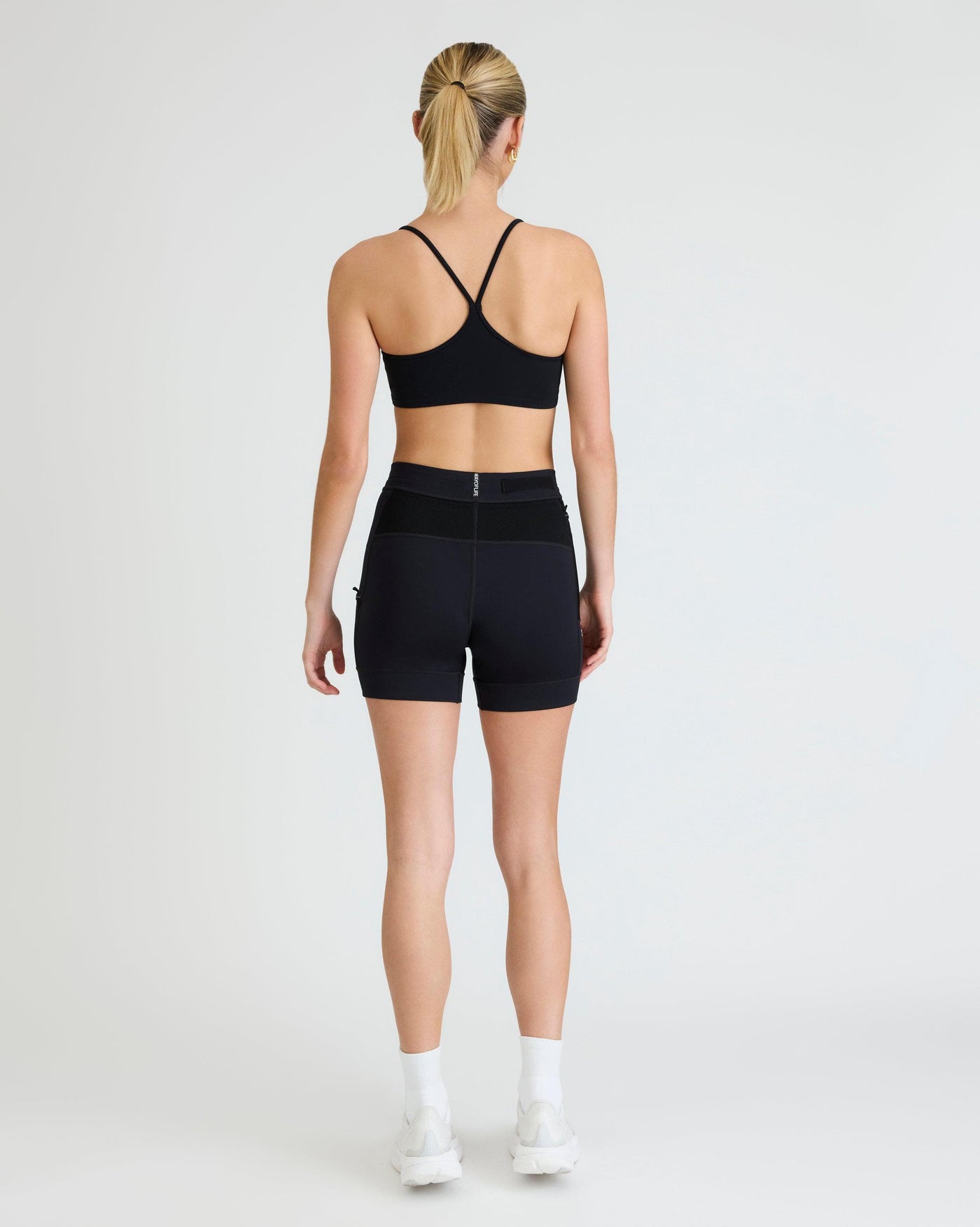 Olivia (5'8") is wearing size small 4" inseam