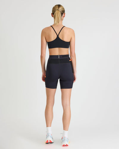 Olivia (5’8”) is wearing a size small 7" inseam