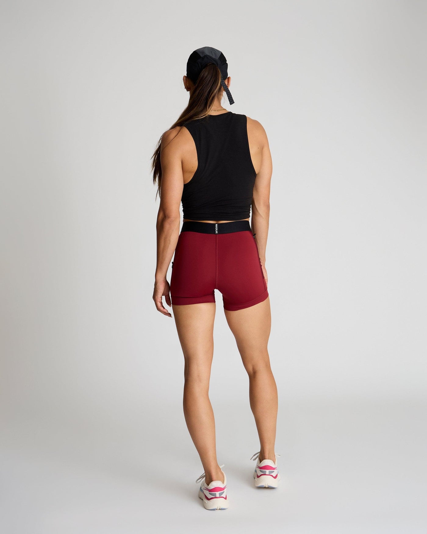 Meghan (5'8") is wearing size small 4" inseam