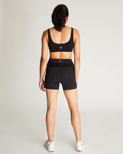Isabella (5'7") is wearing size small 4" inseam