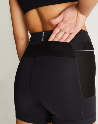 Isabella (5'7") is wearing size small 4" inseam