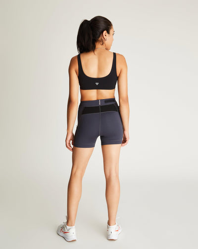 Isabella (5'7") is wearing size small 4" inseam