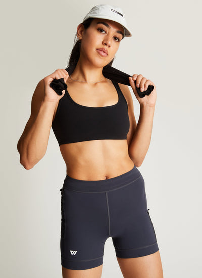 Isabella (5'7") is wearing size small 4" inseam