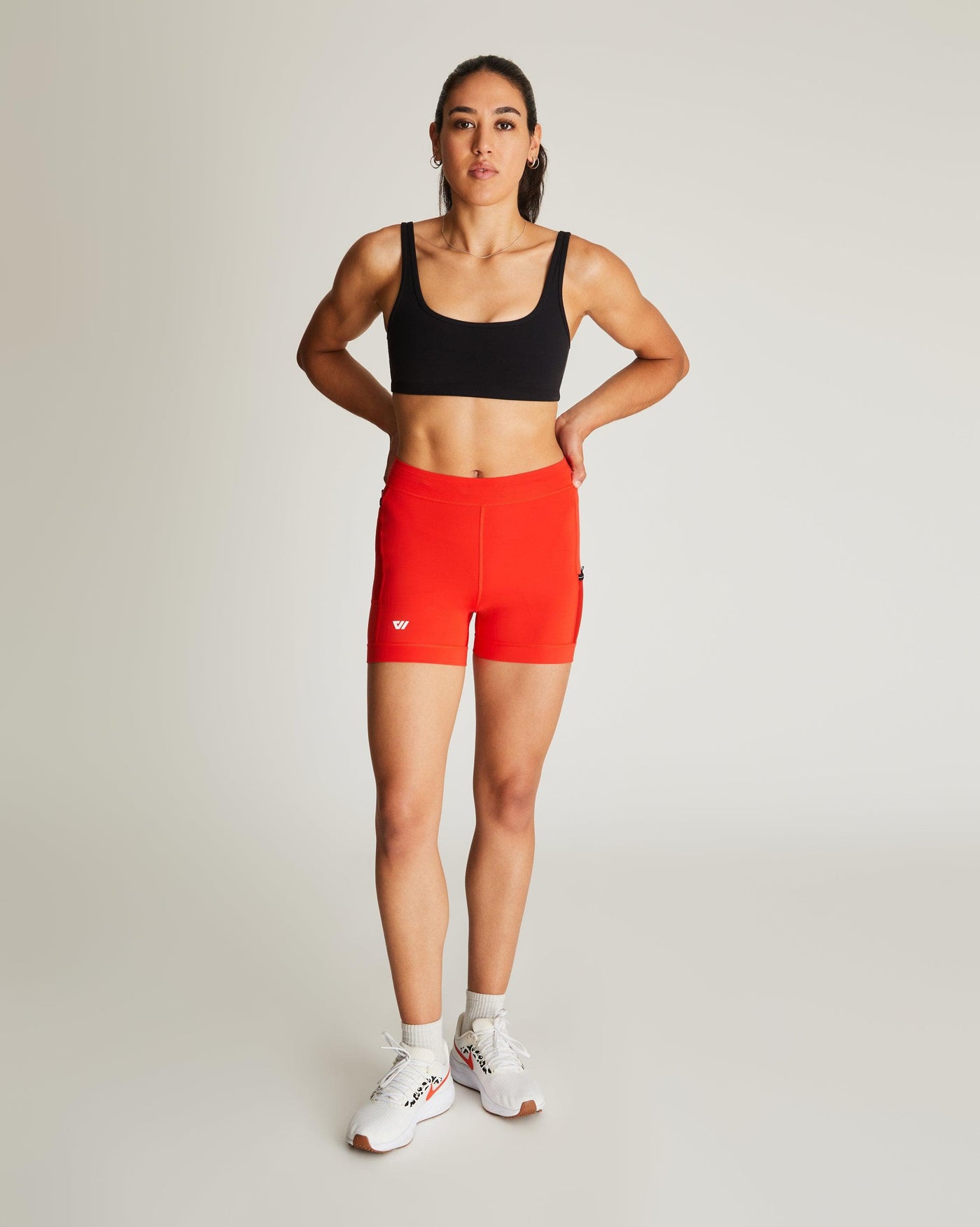 Isabella (5'7") is wearing size small 4" inseam