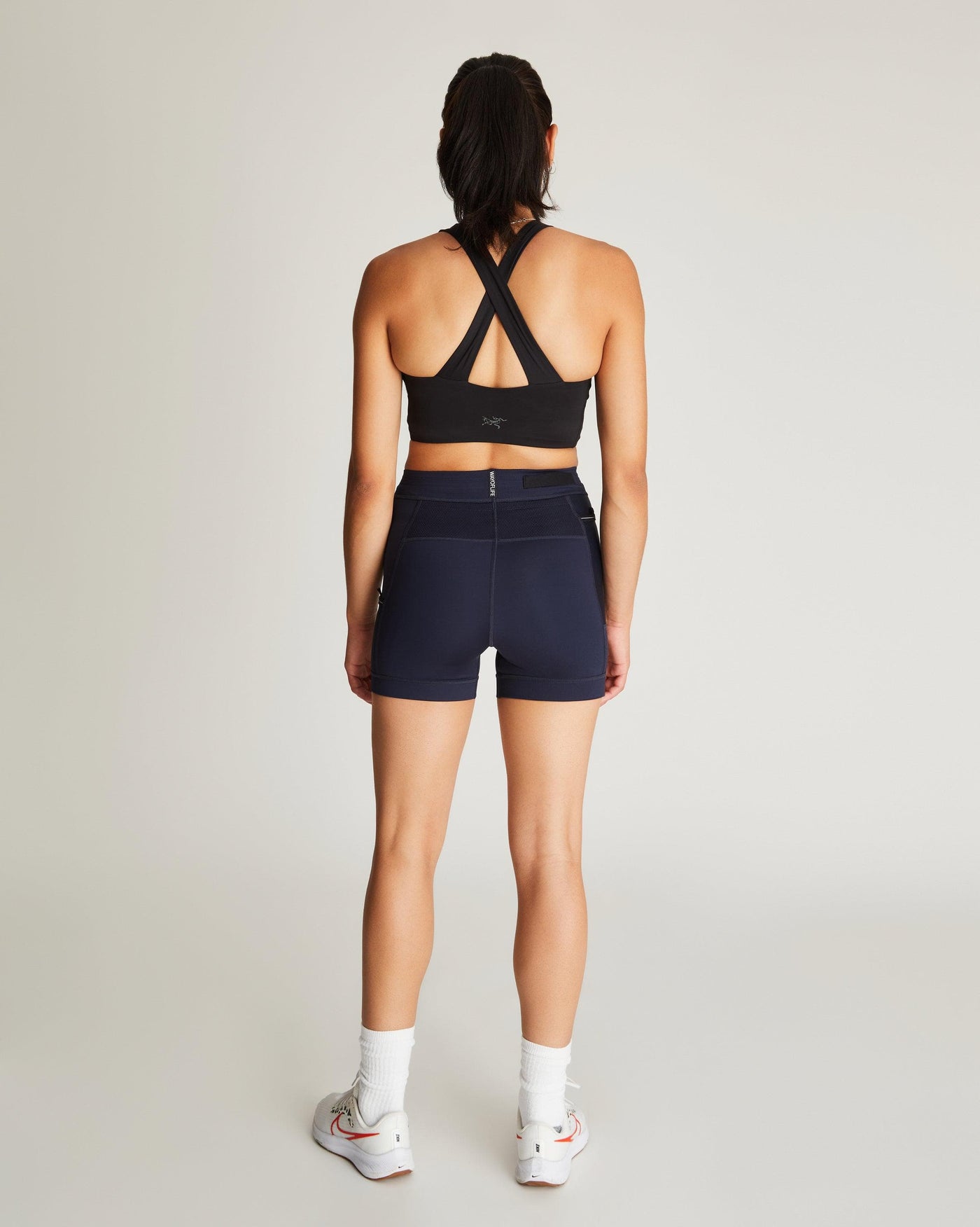 Isabella (5'7") is wearing size small 4" inseam