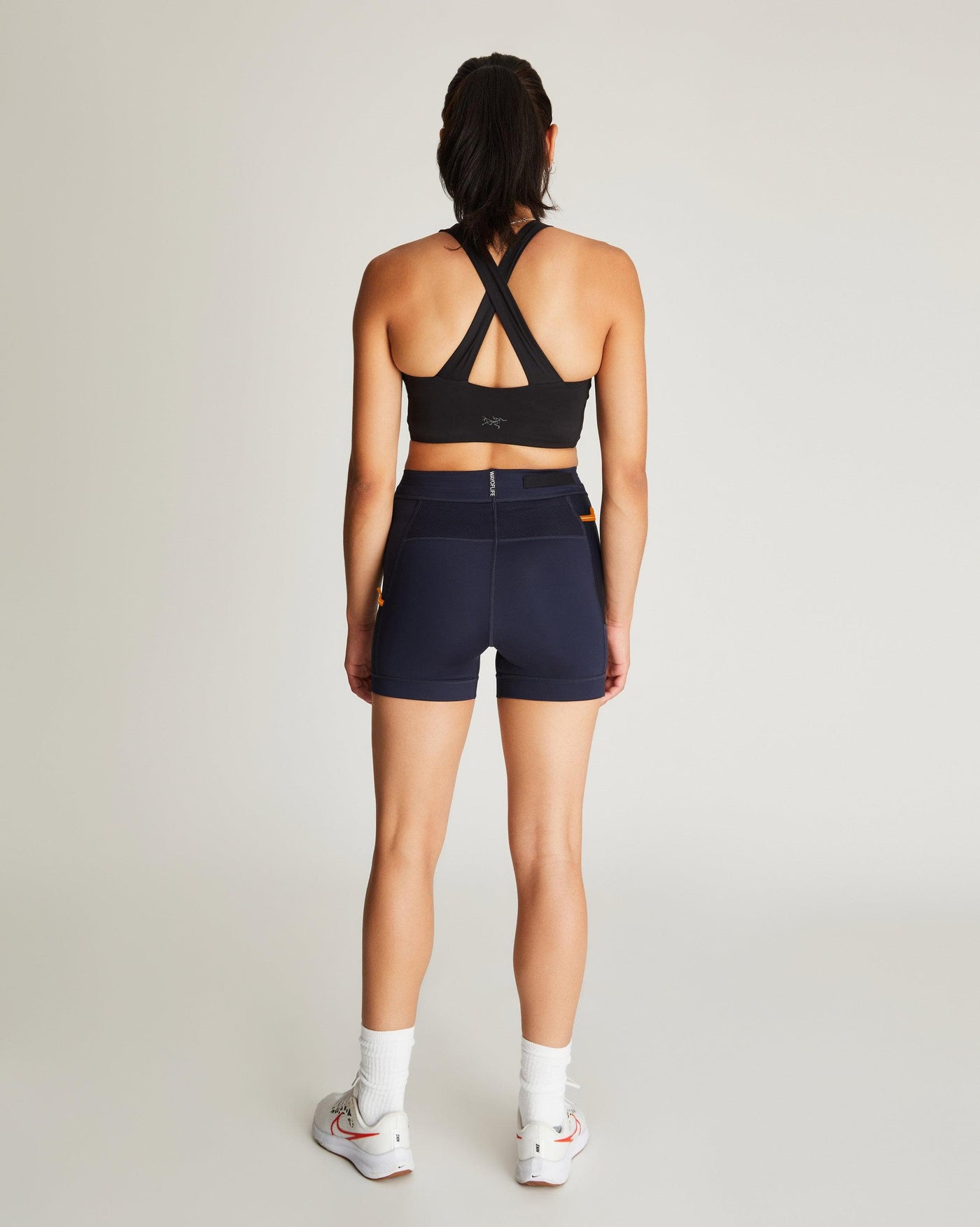 Isabella (5'7") is wearing size small 4" inseam