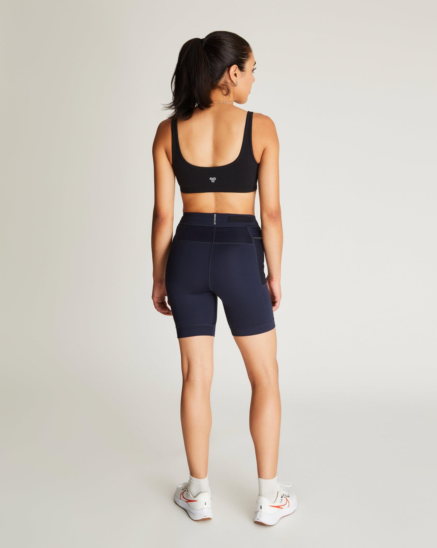 Isabella (5'7") is wearing size small 7" inseam