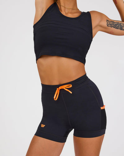 Kyla (5’6”) is wearing a size small 4" inseam