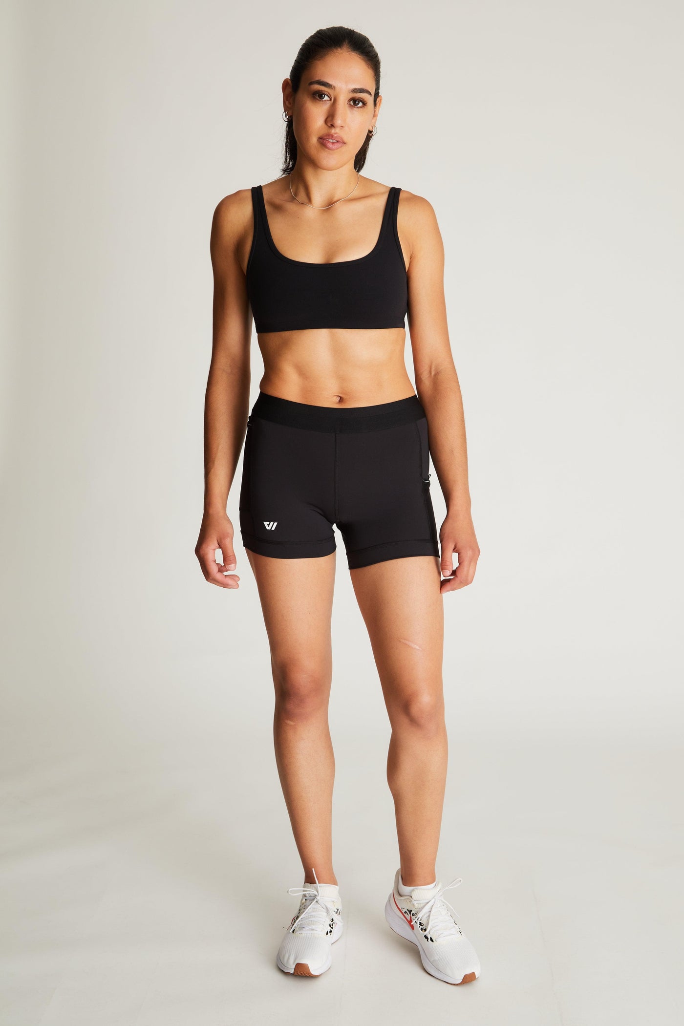 Isabella (5'7") is wearing size small 4" inseam