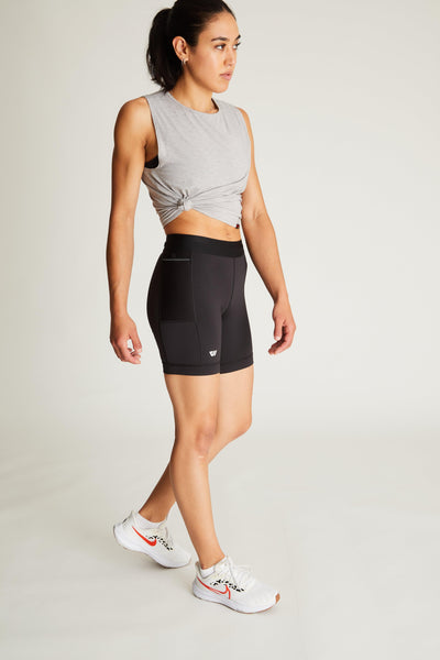 Isabella (5'7") is wearing size small 7" inseam