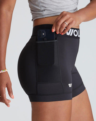 Traci (5'8") is wearing size small 4" inseam