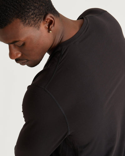 Mikael (6’3") is wearing size medium