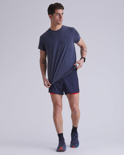 Tom (5'10") is wearing size medium