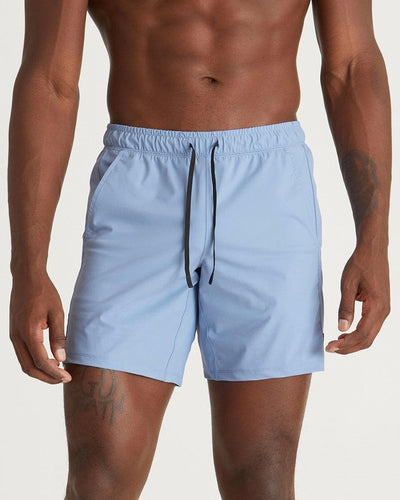 Mikael (6’3") is wearing size medium 7" inseam